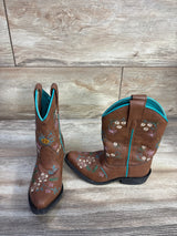 Front and side view of Shyanne brown toddler western boots with turquoise lining and floral embroidery on wood floor