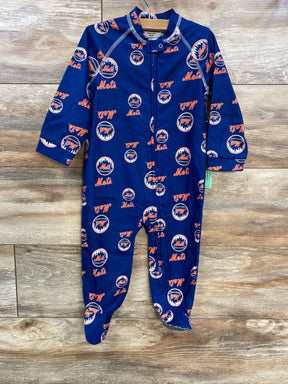 Front view of New York Mets navy zip-up footed onesie showcasing all-over Mets logos and contrast stitching on wood background