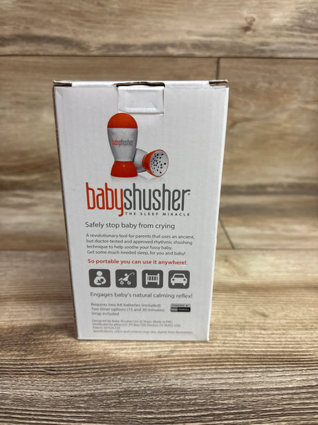 Front view of Baby Shusher Sleep Soother Sound Machine box showcasing a portable shushing device on a wood tabletop