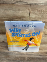 Wei Skates On children's book cover featuring a figure skating boy, wood background