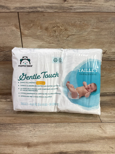 Front view of NEW Mama Bear Gentle Touch Diapers Size 1 50ct showcasing 4 to 6 kg fit marking with wood floor background