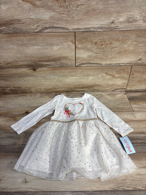White long-sleeve baby dress with embroidered heart and floral design, gold polka dot tulle skirt