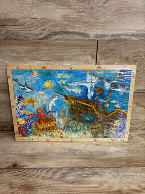 Underwater ocean wooden puzzle featuring sea animals, treasure chest, and sunken pirate ship