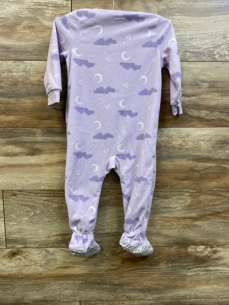 Flat view of Carter’s purple blanket sleeper showcasing long sleeves, footed legs, and moon-and-cloud pattern on wood
