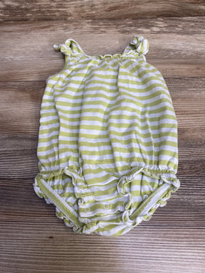 Flat lay of green and white striped baby romper, 6-12m, with knotted shoulder straps and snap crotch on wood background