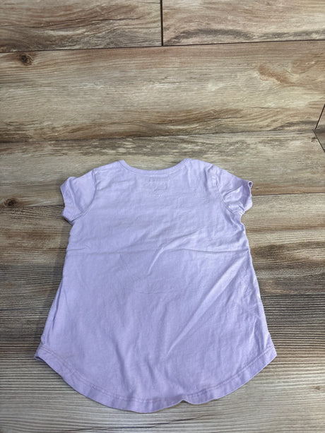 Back view of girls Nickelodeon Santiago of the Seas lilac t-shirt showing short sleeves and curved hem on wooden floor