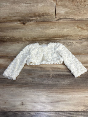 White textured long sleeve baby jacket on wood floor, kids outerwear clothing