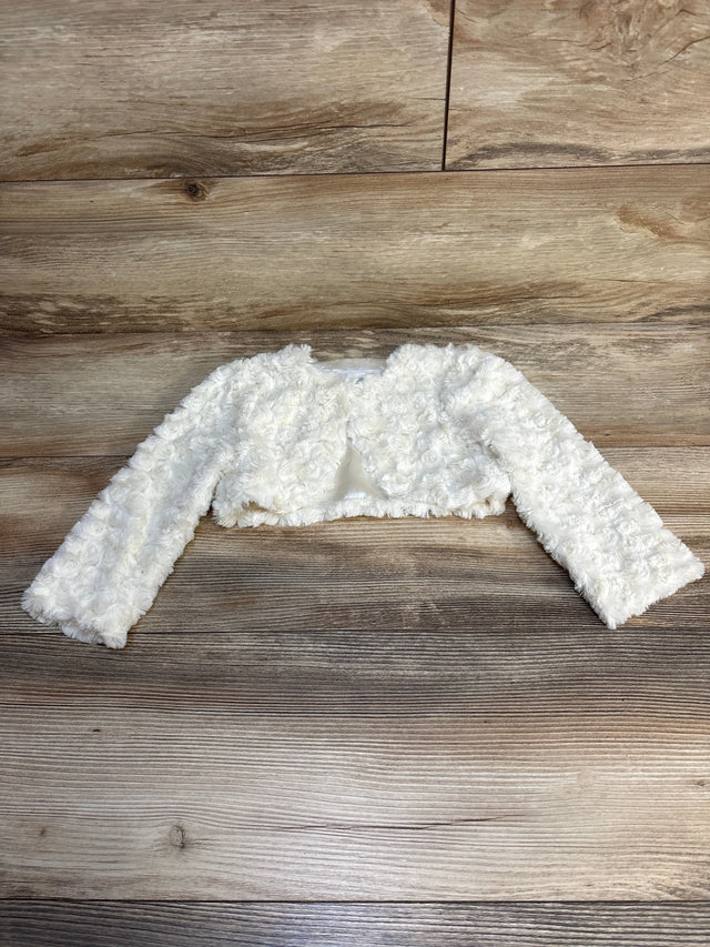 White textured long sleeve baby jacket on wood floor, kids outerwear clothing