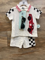 Top-down view of Little Lad white 3-piece polo shirt, shorts, and sunglasses set with racing car and checkered accents