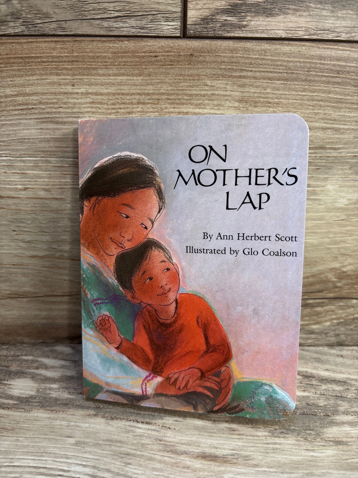 On Mother's Lap Board Book