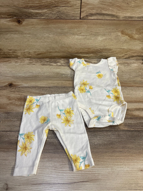 Carter's 2pc white bodysuit and pants set for baby with yellow floral print on wood background