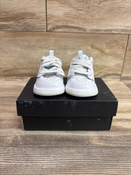 Front view of Air Jordan 4 Retro TD Hyper Violet sneakers with white uppers and light blue accents on a black shoebox