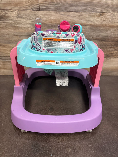 Front view of Safety 1st Ready, Set, Walk DX Developmental Walker showing patterned seat, activity tray with mirror and spinner and pastel purple base