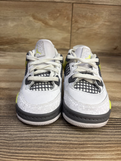 Front view of Air Jordan 4 Retro TD Light Lemon Twist sneakers showcasing white uppers, black mesh panels, and lime accents on a wood surface