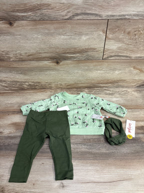 Mint green floral baby sweatshirt, olive leggings, and matching headband set on wood floor