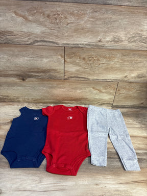 Top view of Carter’s 3-piece Home Run bodysuit set, size 12m, with navy and red bodysuits, gray pants, and wood floor