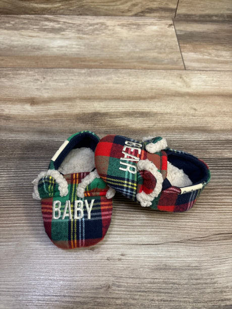 Top view of Dearfoams Baby Bear Slippers showcasing red, green, and navy plaid, bear ears, and white fleece lining