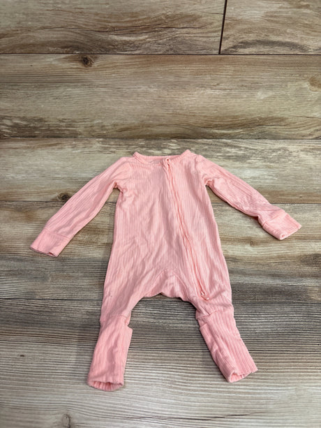 Front view of Carter’s PurelySoft pink newborn sleeper showcasing long sleeves, front zipper, and footed legs with a wood-grain background