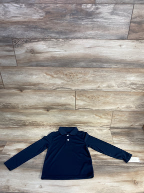 Navy blue long-sleeve polo shirt with collar and two white buttons on wooden floor background