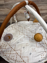 Baby activity gym with star-patterned mat, plush toys, and hanging rattles for newborns and infants