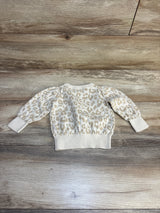 Baby leopard print long sleeve sweater on wood floor, kids clothing resale