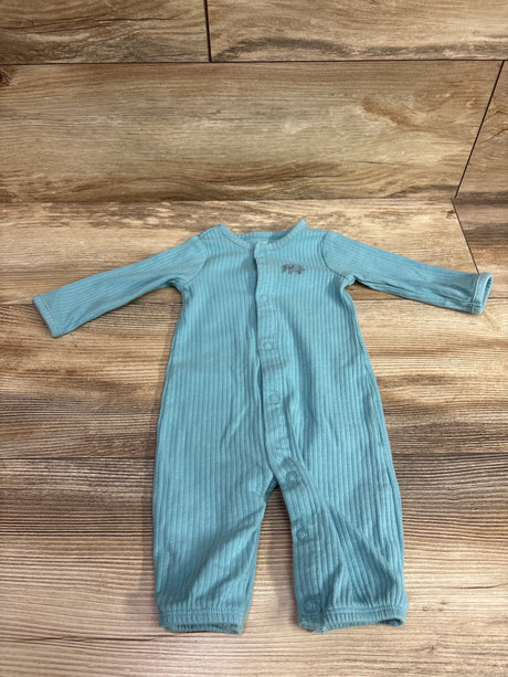 Front view of blue Just One You ribbed footless snap sleeper, size 3 months, with long sleeves and front snaps on wood