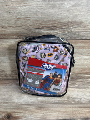 Justice League themed reusable cloth diaper set in clear zippered pouch on wood background