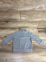 Gray long-sleeve toddler pullover with zip collar on wooden floor, kids clothing