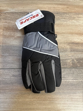 Black and gray insulated winter glove with tag, kids outerwear on wood background
