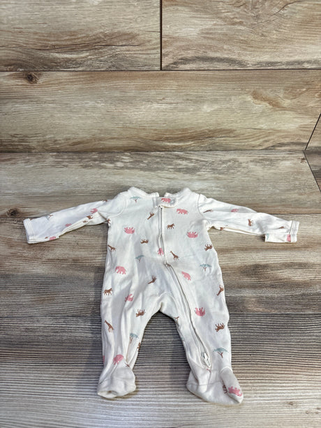 Flat lay of ivory preemie footed sleeper with pink animal print and front zipper on wood background