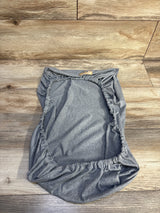 Top-down view of BlueSnail soft stretchy grey bassinet fitted sheet showing elasticized edges on wood floor