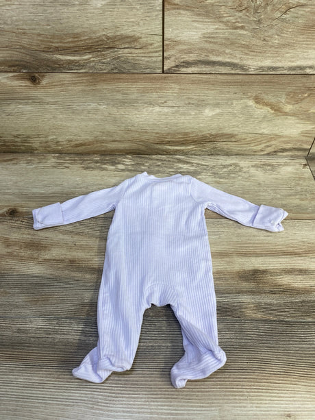 Back view of Carter's preemie purple ribbed footed sleeper showing ribbed texture and fold-over cuffs on light wood background