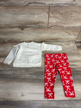 White ruffle-sleeve top and red bow-print leggings for kids