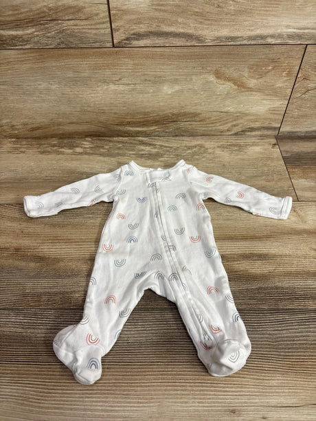 Flat lay of Simple Joys preemie white sleeper showing front zipper and multicolor rainbow print on wooden floor background