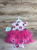 Front view of newborn pink Disney Minnie Mouse bodysuit with hot-pink tulle tutu on wood plank background