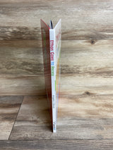 Children's book titled Ethan Goes to Recess by Angela L. Glover standing on wooden floor