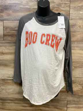 White and gray long sleeve shirt with 'BOO CREW' in orange, displayed on mannequin for kids or maternity wear.
