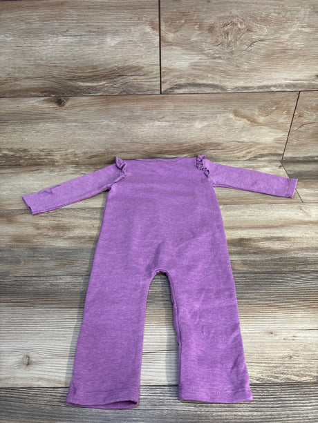 Purple baby onesie with ruffled shoulders, laid flat on wood floor. Soft knit, long sleeves, ideal for infants.
