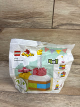 Front view of LEGO DUPLO Celebration Cake showcasing cake with candle and 4-in-1 build options on wood floor