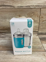 Front of Mason Bottle 8 oz kit box showing two mason-style baby bottles, one with blue silicone sleeve on wood background