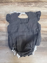 Gray baby romper with white pom-poms and ruffled sleeves, ideal for kids' clothing resale