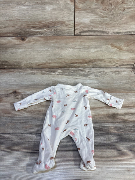 Flat-lay of ivory preemie footed sleeper showing pink elephant and brown animal prints and scalloped neckline on wood floor background