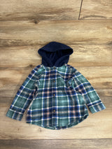 Plaid flannel button-up toddler shirt with navy hood on wood background