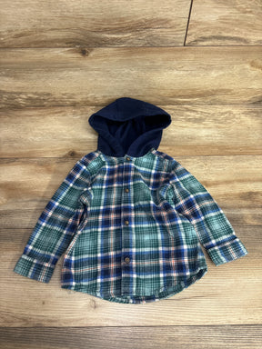 Plaid flannel button-up toddler shirt with navy hood on wood background