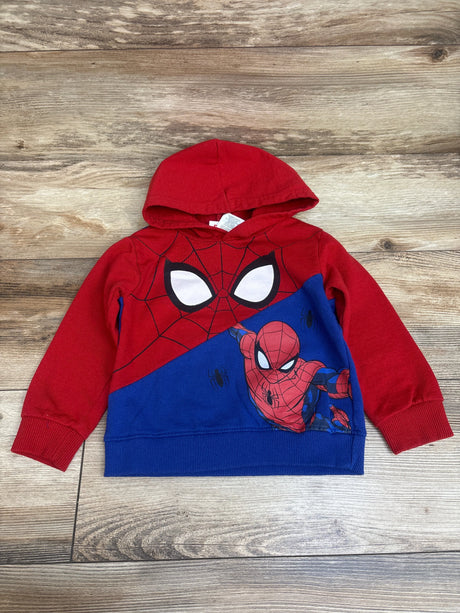 Front view of Marvel Spider-Man pullover hooded sweatshirt, red and blue with web graphics, on wood-grain background