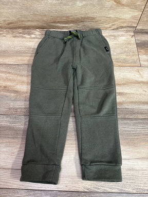 Front view of Lee green drawstring joggers in size 3T showcasing side pockets and paneled legs on a wood-patterned background