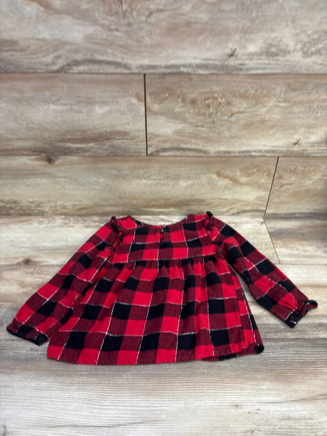 Front view of a red and black plaid Jumping Beans flannel top, size 4T, with long sleeves and gathered hem