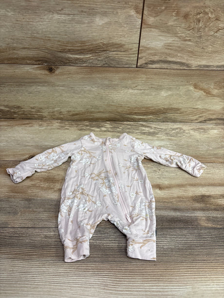 Top-down view of pink floral footless viscose sleeper with front zipper on a wood-grain surface