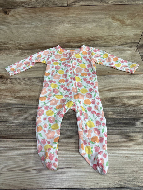 Top-down view of Millie & Myles sleeper showcasing colorful fruit print, long sleeves, and footed legs on wood flooring