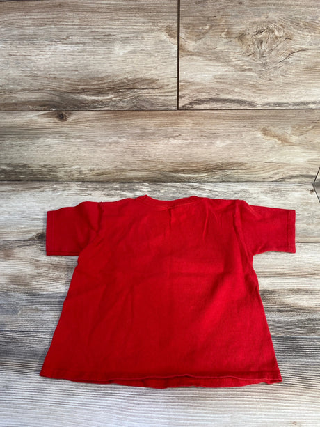 Back view of red PAW Patrol Marshall toddler t-shirt size 4T laid flat on wood background showing short sleeves and crew neck